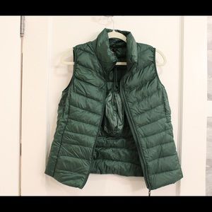 Green puffer vest with attached bag (can remove)